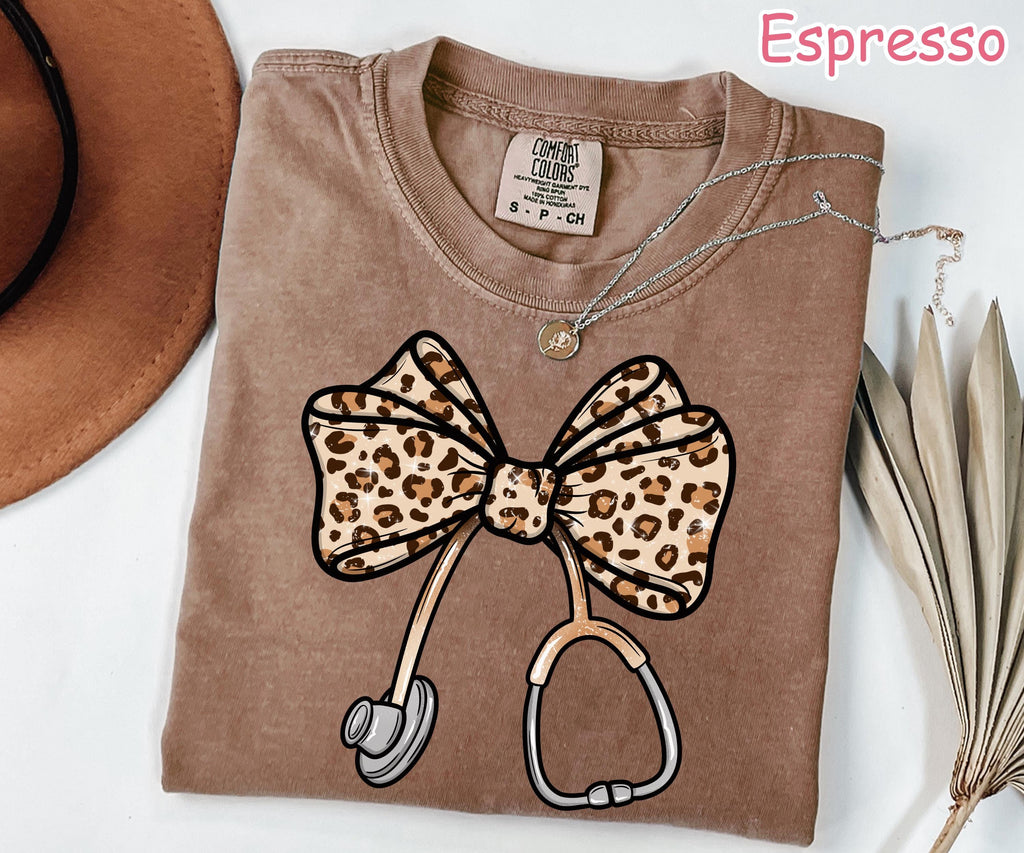 Comfort Colors® Coquette Bow Nurse Shirt, Trendy Leopard Nursing Shirt, Nurse Gift, Nurse Appreciation Gift, RN Shirt, Registered Nurse Tee