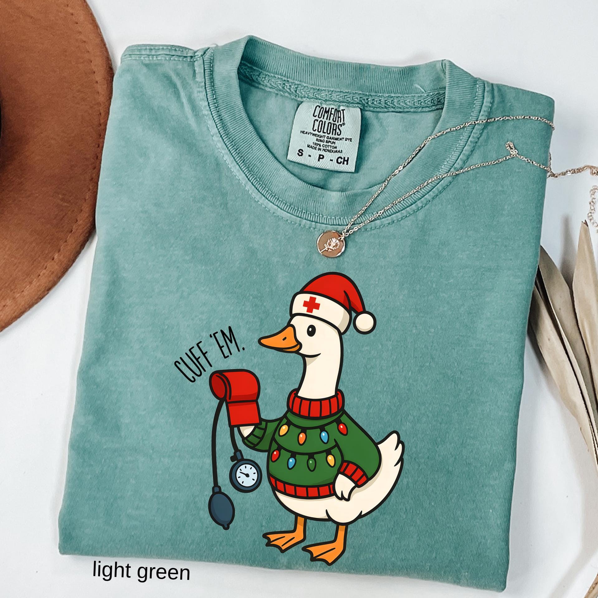 Comfort Colors© Cuff Em Funny Goose Nurse Christmas Shirt, Medical Humor RN Nurse Gift